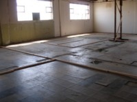 Warehouse - Before (glued tiles stuck directly on timber).