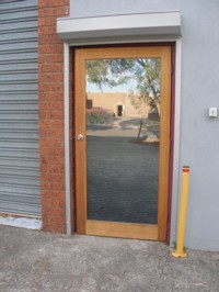 External door - After. The frame is now protected against UV rays and weathering
