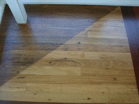 Recycled Tallowood in Showroom -  2 different stains.